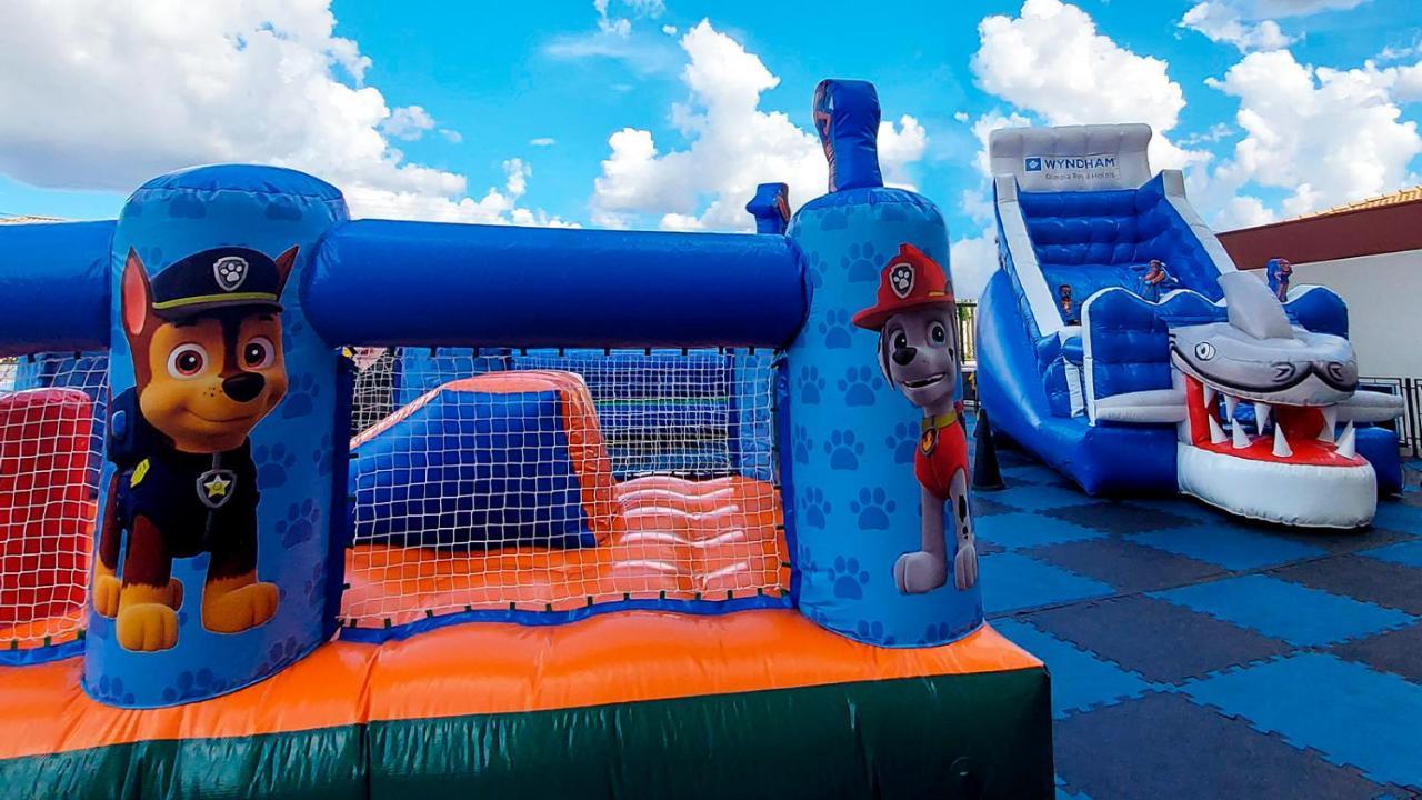 Wyndham Olimpia Royal Hotels Bagian luar foto Paw Patrol bouncy castle