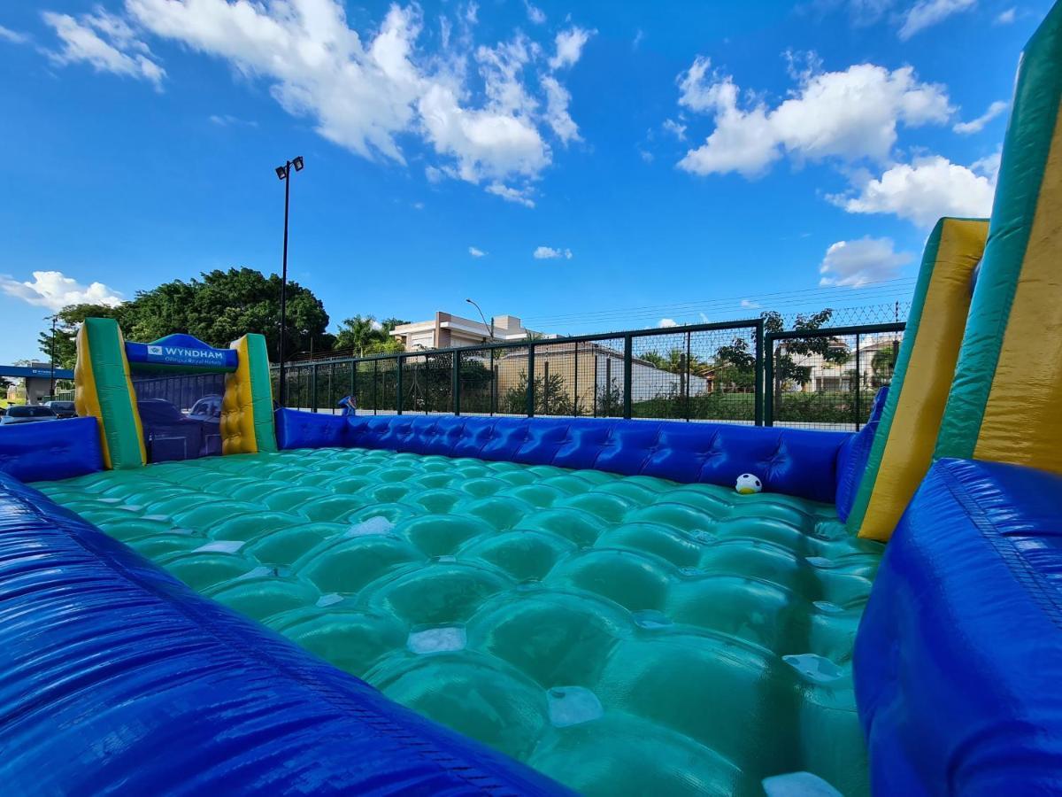 Wyndham Olimpia Royal Hotels Bagian luar foto A water pillow