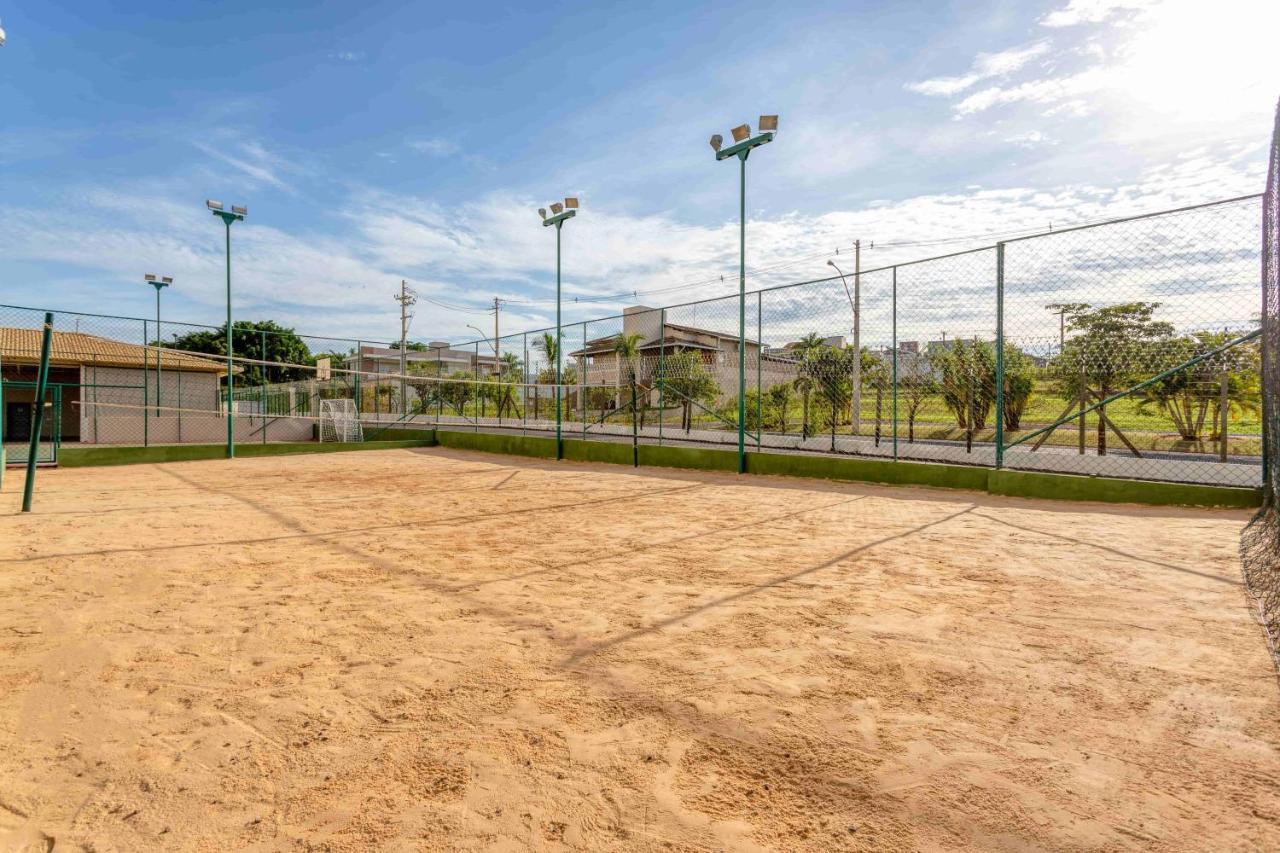 Wyndham Olimpia Royal Hotels Bagian luar foto A beach tennis court in Rio de Janeiro, Brazil